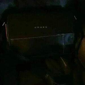 new CROSS leather and vinyl lap top brief case  will take a 15 inch max book pro